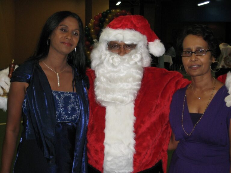 Santa's helpers ( elves- GFLF members ) pose with Santa