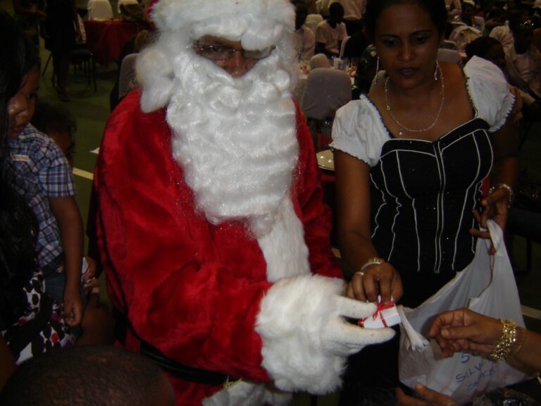 GFLF member helps Santa with the Jewellery gifts
